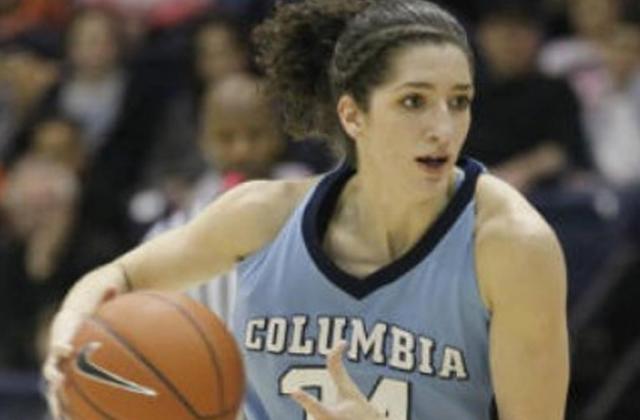 Lauren Dwyer playing basketball during her time at Columbia